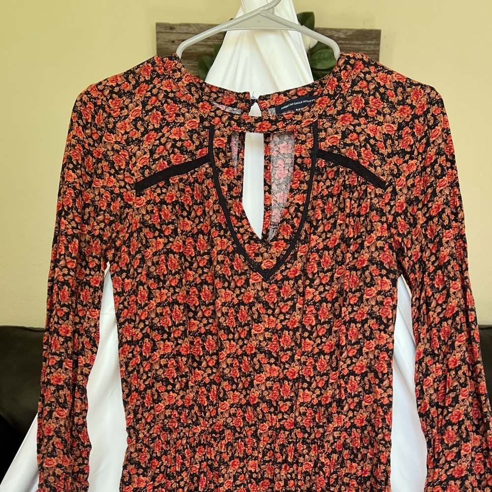 Orange and black keyhole floral dress